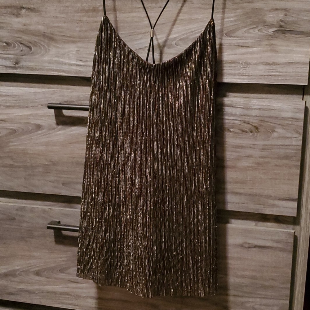 Express shiny gold top